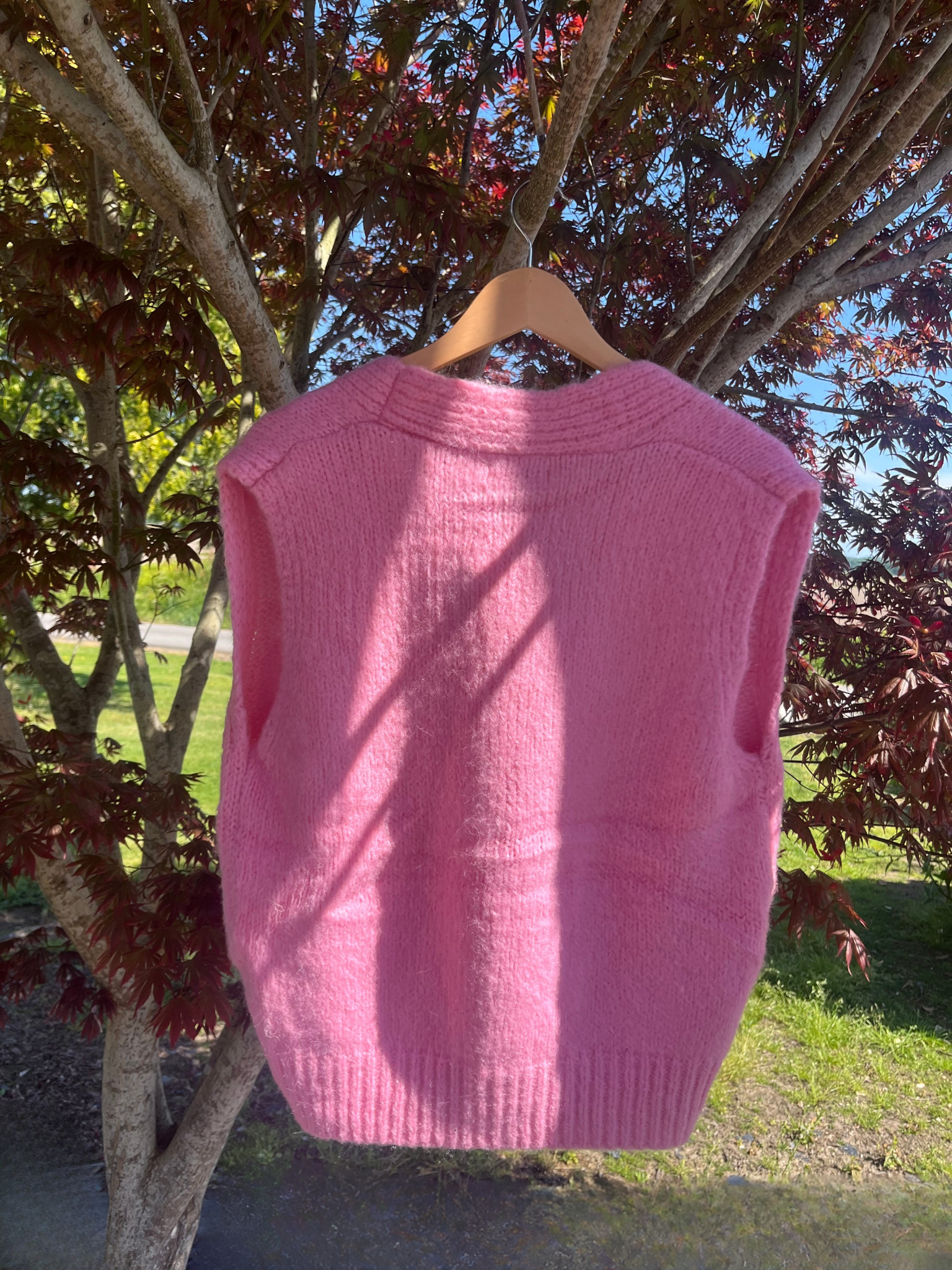 Pull sans manches rose pétale